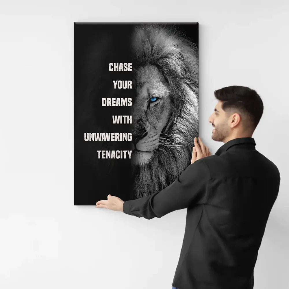 Holding lion mindset wall art piece.